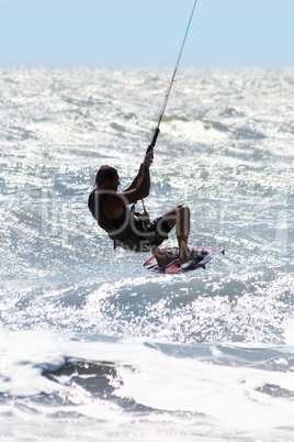 Silhouette of kite surfer