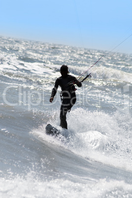 Silhouette of kite surfer