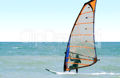 Windsurfer on the sea in the afternoon