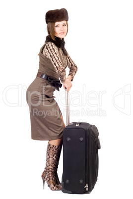 Young beautiful lady with a suitcase. Isolated