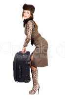 Young woman with a suitcase. Isolated on white