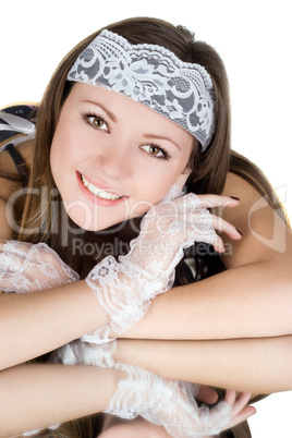 Portrait of the pretty girl laying on a mirror