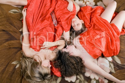 Three sleeping beautiful girls after a party