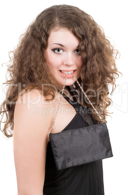 Girl with a handbag in a teeth