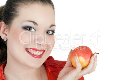 Portrait of the young woman with an apple