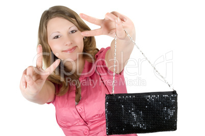 Beautiful playful young woman with a handbag. Isolated