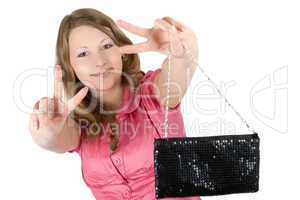 Beautiful playful young woman with a handbag. Isolated