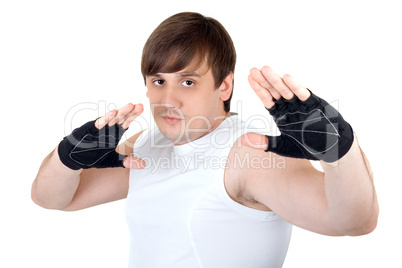 Portrait of the young fighter. Isolated on white background