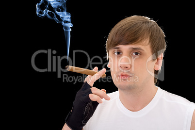 Portrait of the young man with a cigar