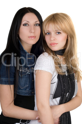 Portrait of the two pretty girlfriends. Isolated on white