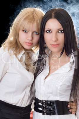 Portrait of the young brunette and blonde