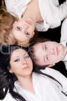 Portrait if the young man and two beautiful women