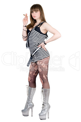 Girl in a striped dress and silvery boots