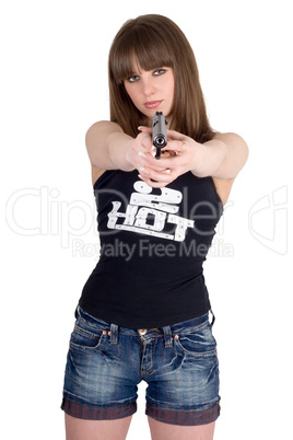 Pretty girl in shorts and a vest with pistol