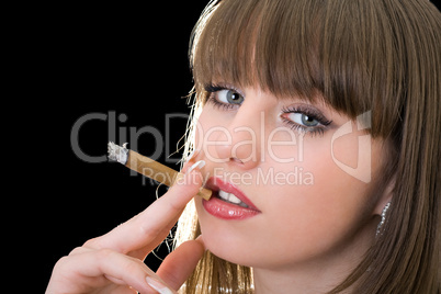 Portrait of the pretty girl with a cigar