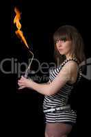 Pretty young woman with a gas torch. Isolated