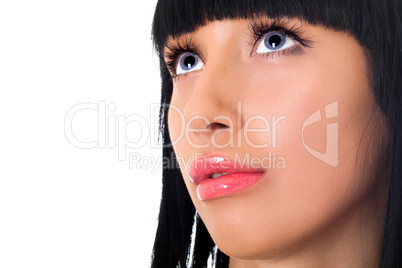 Portrait of the lovely girl looking upwards