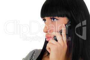 Portrait of the girl speaking on the phone. Isolated