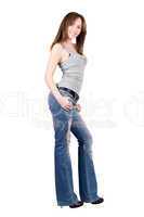 Pretty young woman in a blue jeans. Isolated