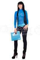 Smiling girl with a blue handbag. Isolated