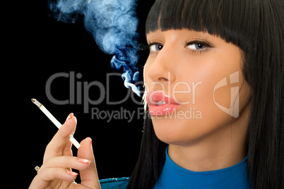 Portrait of the cute woman with a cigarette