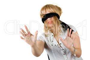 Beautiful young woman blindfold. Isolated on white