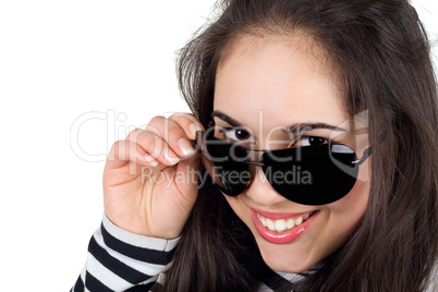 Portrait of the smiling girl in sunglasses