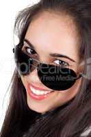 Portrait of the smiling girl in sunglasses. Isolated