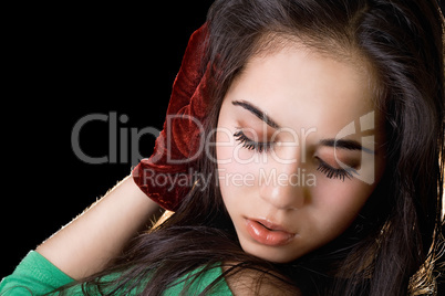 Portrait of the girl with closed eyes. Isolated