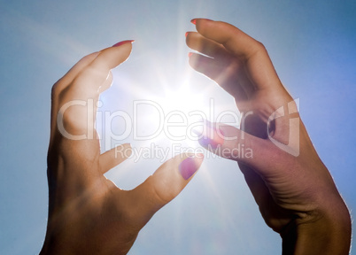 hands and sun