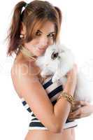 Pretty young woman with rabbit