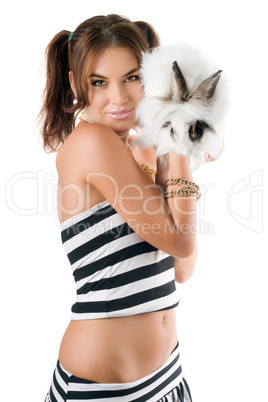 Smiling young woman with little white rabbit