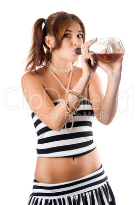 Sexy young woman drinking whiskey