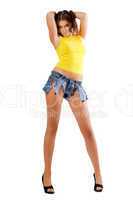 young woman posing in ragged shorts