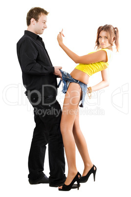 Young man flirting with woman in shorts