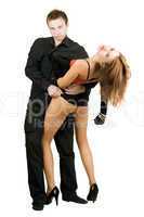 man stripping woman