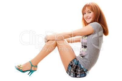 Playful red-haired young woman