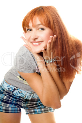 Close-up portrait of happy red-haired girl