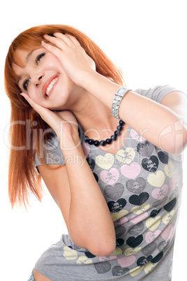 Close-up portrait of cheerful red-haired girl