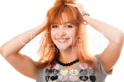 Portrait of cheerful beautiful red-haired girl