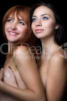 Two naked smiling women