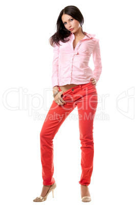 Beautiful young brunette in red jeans