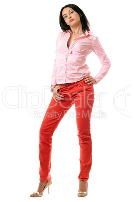 Attractive young brunette in red jeans