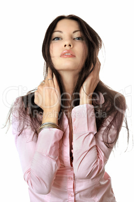 Portrait of pretty young woman in pink shirt