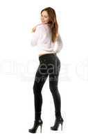 Playful beautiful girl in black tight jeans