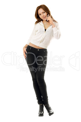 Smiling young woman talking on the phone