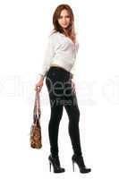 Girl in black tight jeans with a handbag