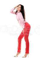 Playful young woman in red jeans
