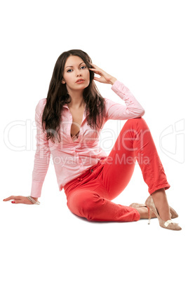 Young brunette in red jeans