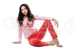 Beautiful young woman in red jeans